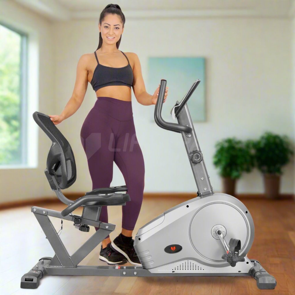 lifespan rc-81 recumbent exercise bike with person standing next to it