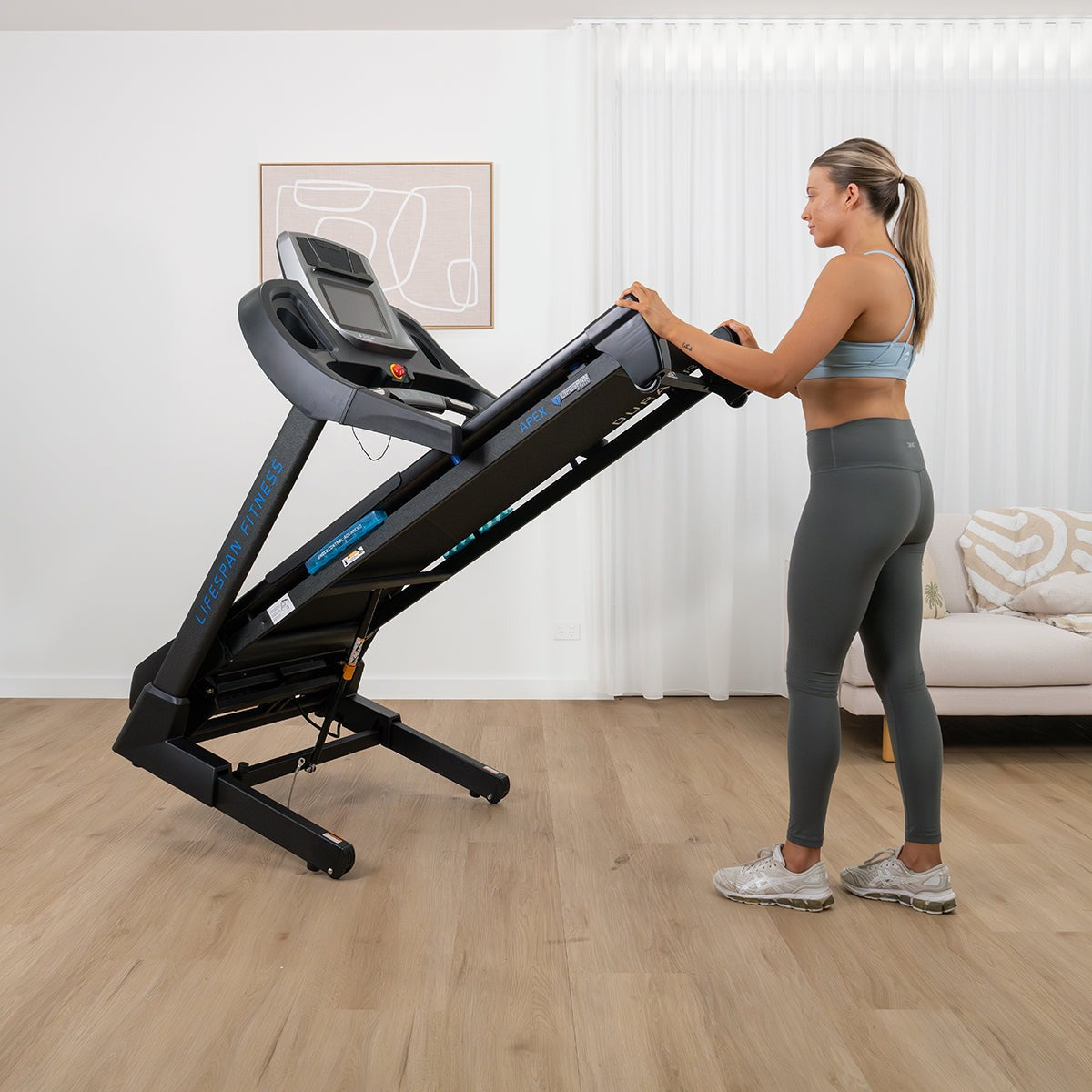 Lifespan Fitness Apex 2 Treadmill featuring a sleek design, user-friendly control panel, and DuraGrip surface for optimal stability and comfort during workouts.