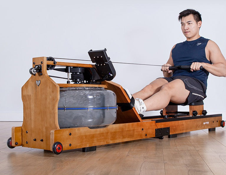 Lifespan Fitness ROWER-760 foldable water rowing machine featuring a sleek wooden design, transparent water tank for resistance, and adjustable foot straps, perfect for indoor fitness enthusiasts.