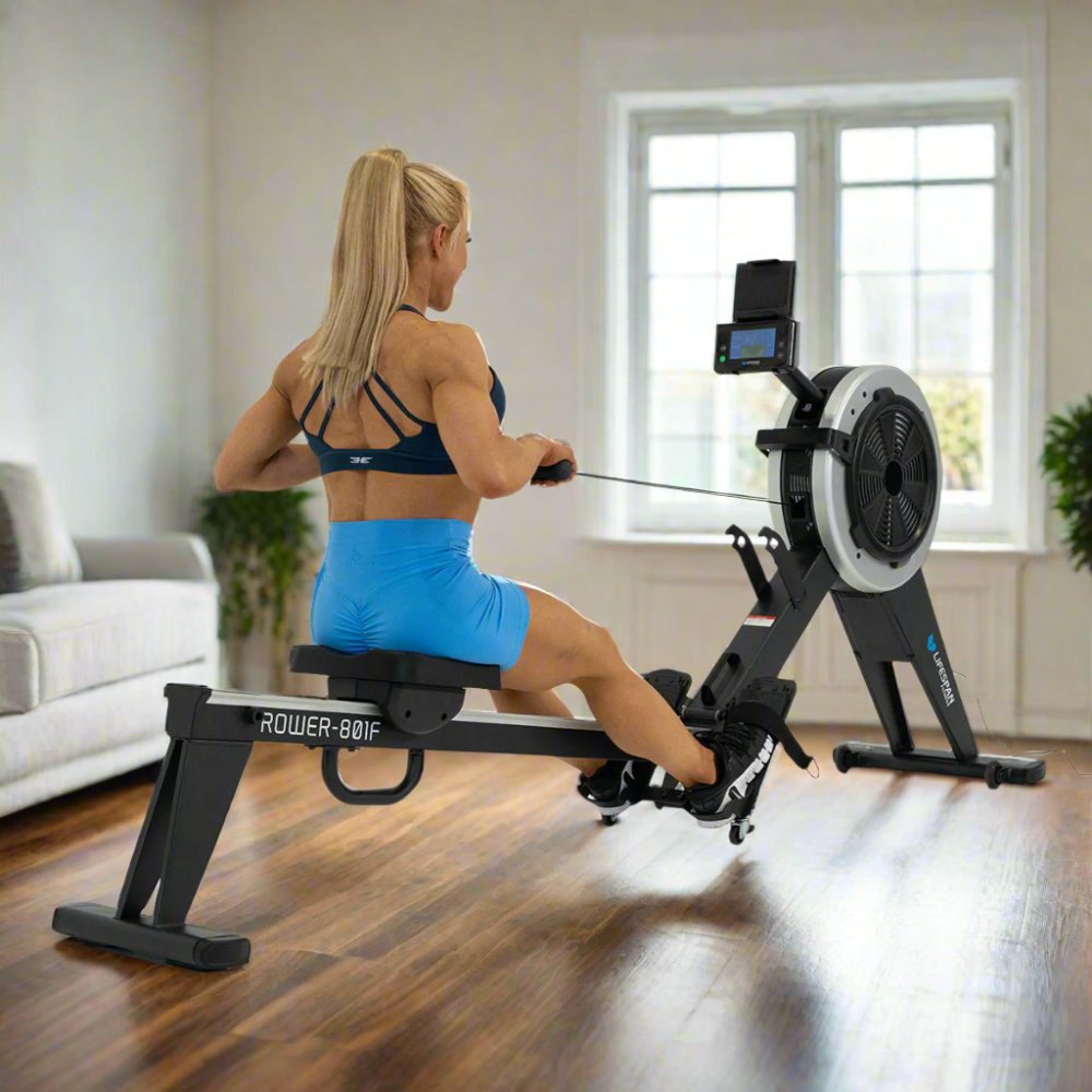 Lifespan Fitness ROWER-801F Air & Magnetic Commercial Rowing Machine, featuring adjustable resistance levels, ergonomic design, and a digital display in a bright, indoor setting.