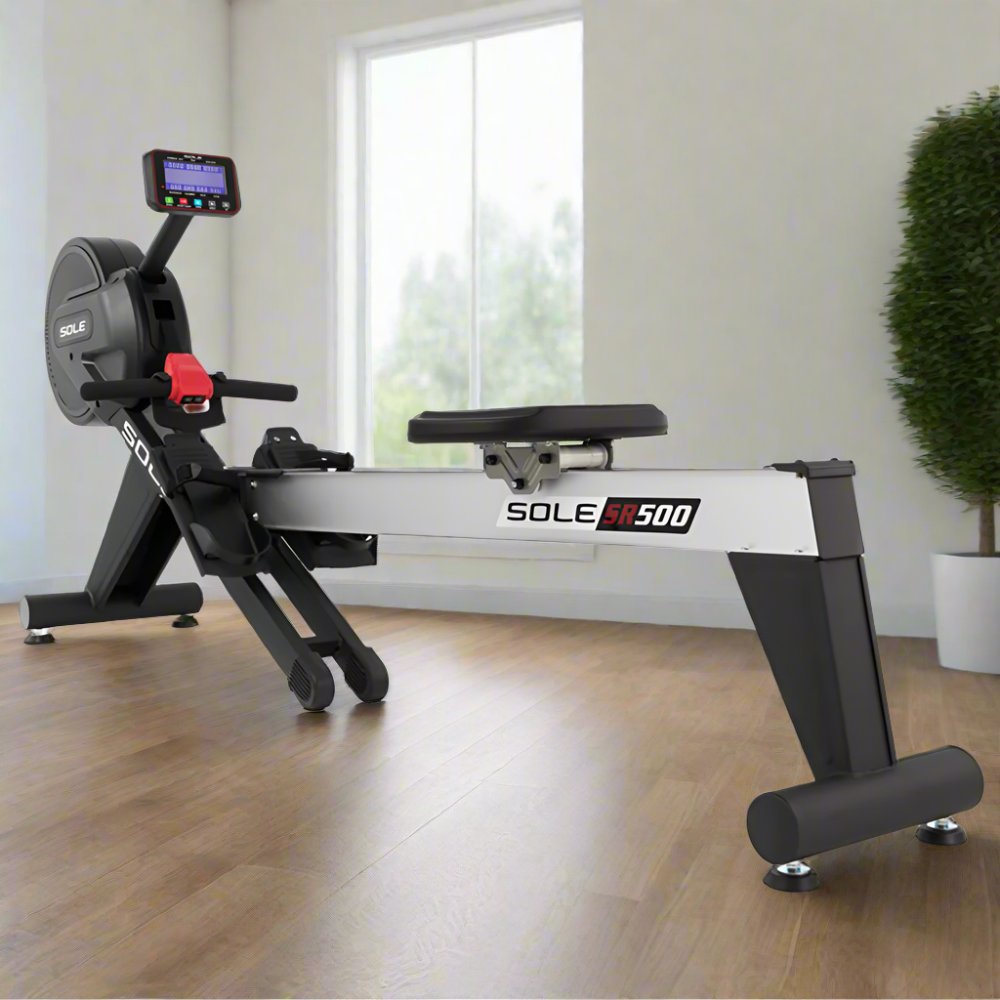 Front view of Sole SR500 Rowing Machine showing console and pedals