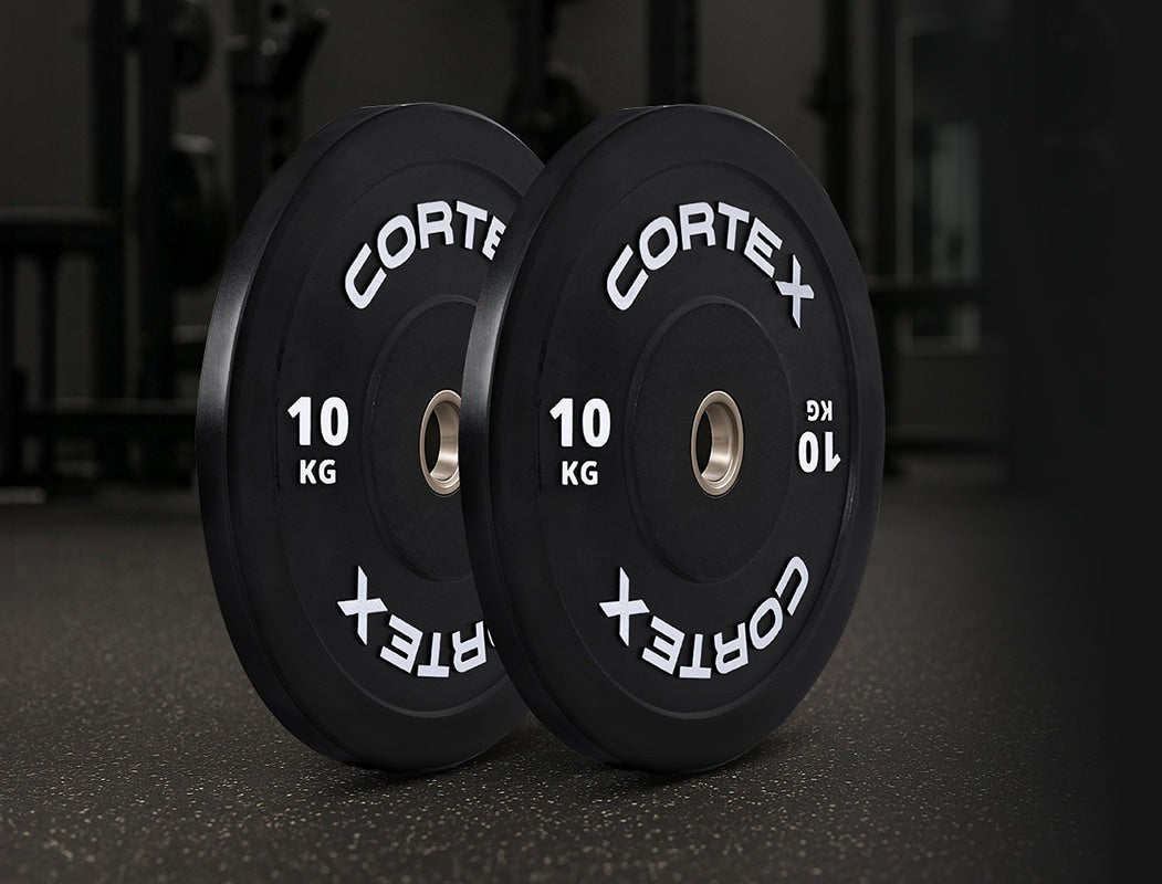 Cortex 10kg Black Series V3 Bumper Plates (2 Pack) designed for strength training, featuring durable rubber construction and clear weight markings for home gym use.