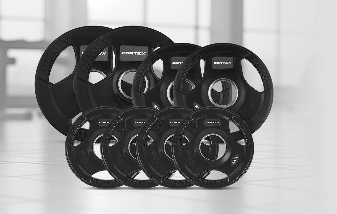Cortex 35kg Tri-Grip V2 rubber Olympic weight plate set, featuring four 50mm plates with easy-to-grip design, perfect for strength training and home gym workouts.