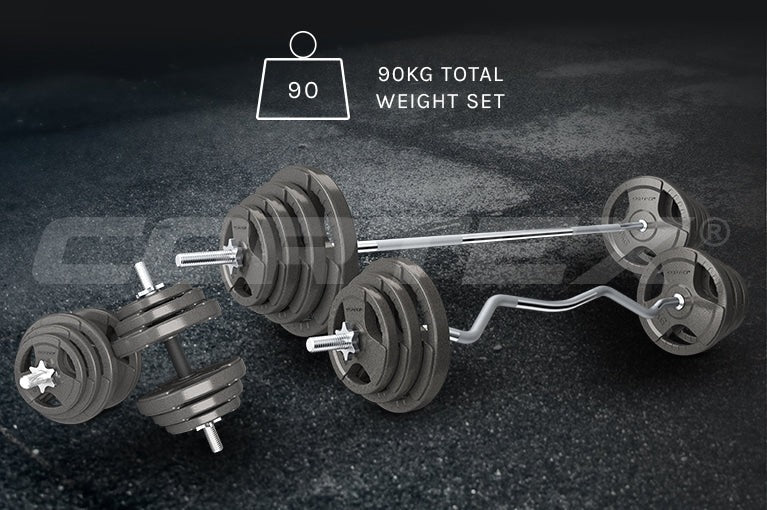 Set of four weightlifting plates in black with rubberized grip handles for strength training