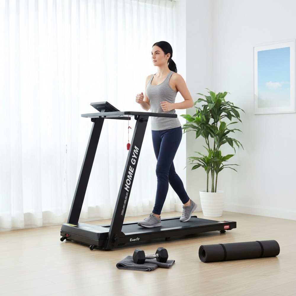 Woman exercising on an Everfit treadmill in a bright home gym setting