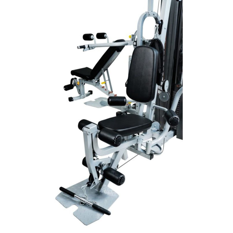 Impulse IF2060 Multi-Station Gym featuring multiple exercise stations including a leg curl and lat pulldown.