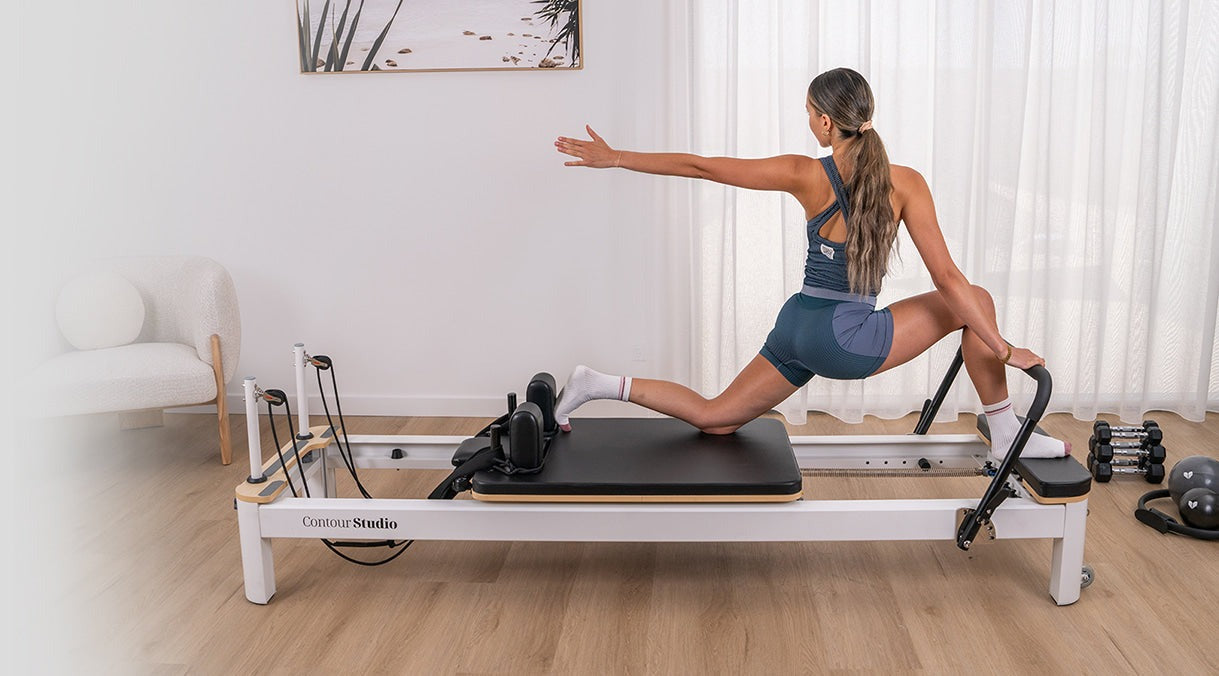 Lifespan Fitness Contour Studio Commercial Pilates Reformer Bed Set featuring adjustable foot bar and headrest for customizable workouts.