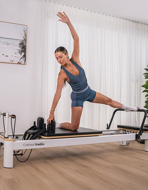 Close-up view of Lifespan Fitness Contour Studio Commercial Pilates Reformer Bed Set highlighting its durability and high weight capacity.