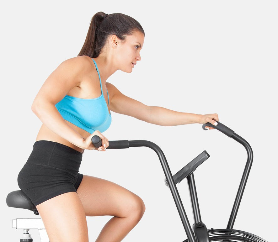 Woman riding Lifespan Fitness EXC-10H Commercial Air Bike