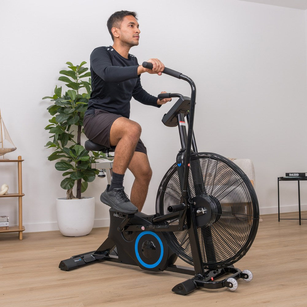 High-performance air bike for full-body workout with adjustable seat and large fan.