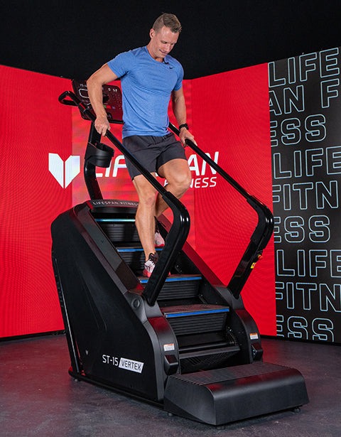 Lifespan Fitness ST-15 Vertex commercial stair climber with four adjustable resistance levels, ergonomic handlebars, and a digital display for effective cardio workouts.