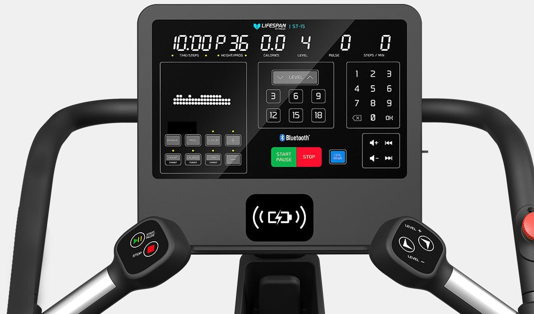 Lifespan Fitness ST-15 Vertex commercial stair climber console showing touchscreen controls, heart rate monitor, and Bluetooth connectivity for fitness tracking.