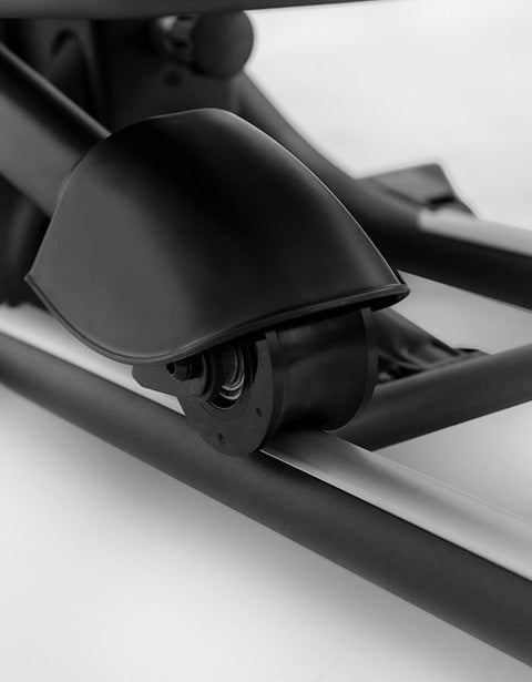 Woman exercising on the Lifespan Fitness XT-39 Folding Cross Trainer, showcasing its compact design, adjustable resistance, and ergonomic features for effective home workouts.