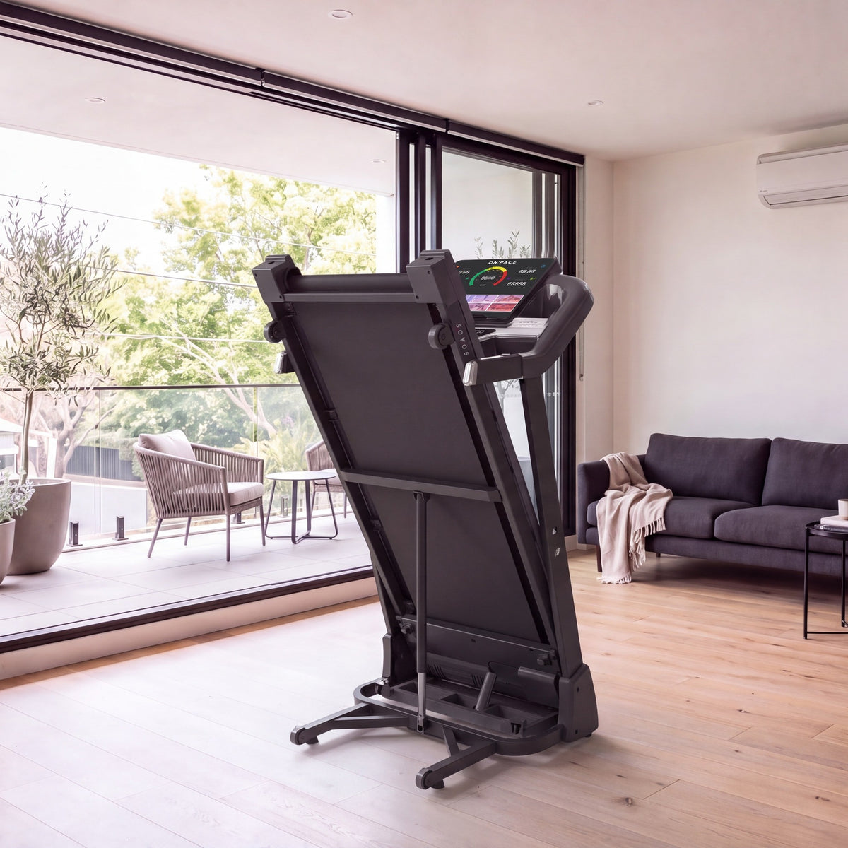 The SOYO 5 folded upright in an apartment living room