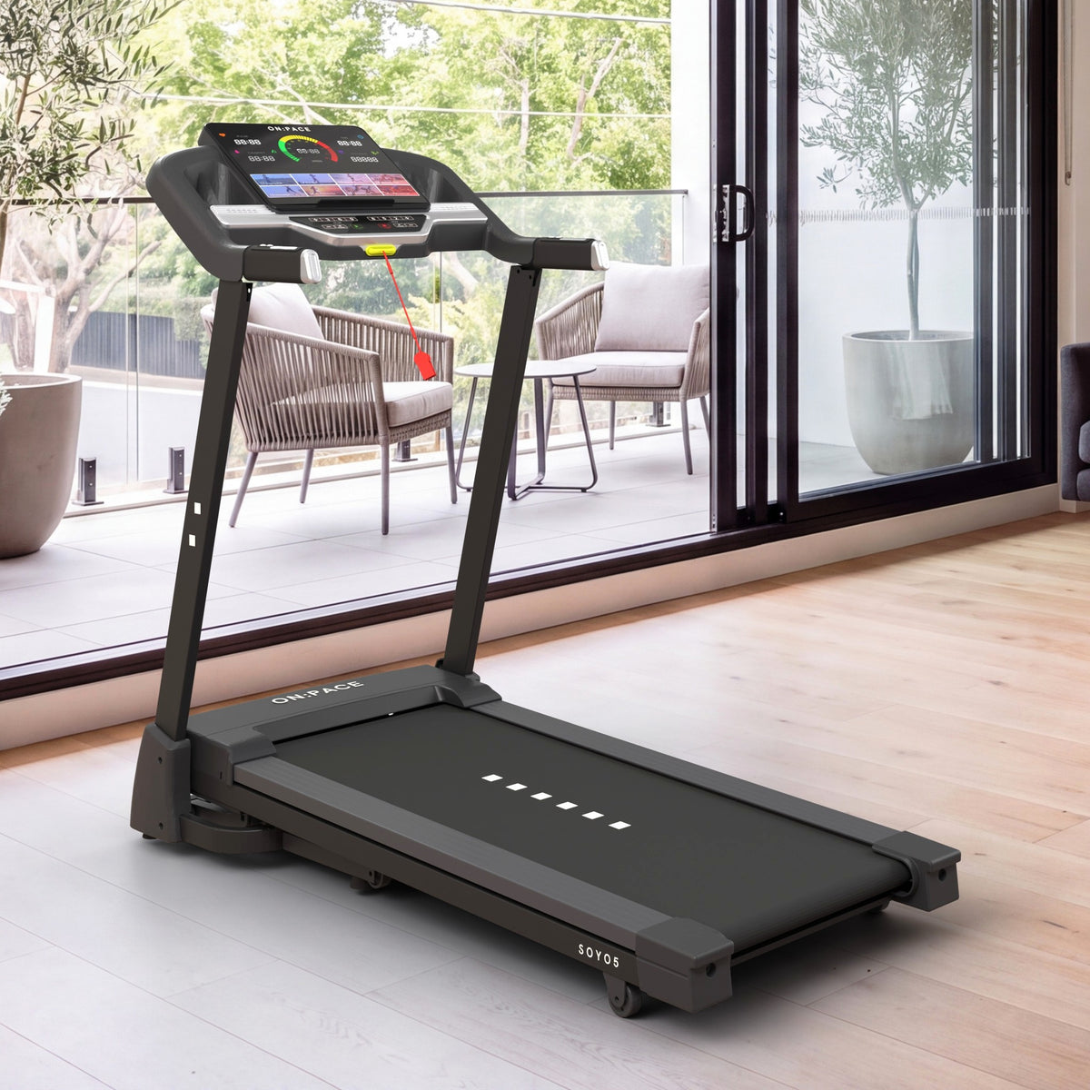The ON:PACE SOYO 5 unfolded in an apartment living room, in front of the balcony doors