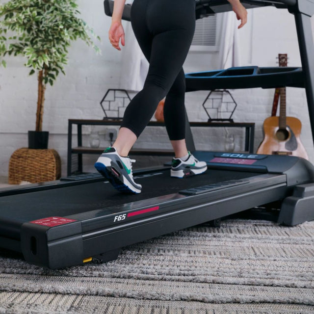 Sole treadmill with adjustable incline and large display for home fitness workouts