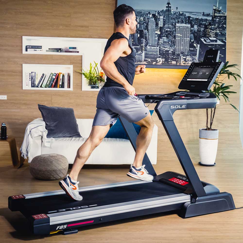 sole f85 treadmill with man running