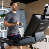 sole f89 treadmill person running front view