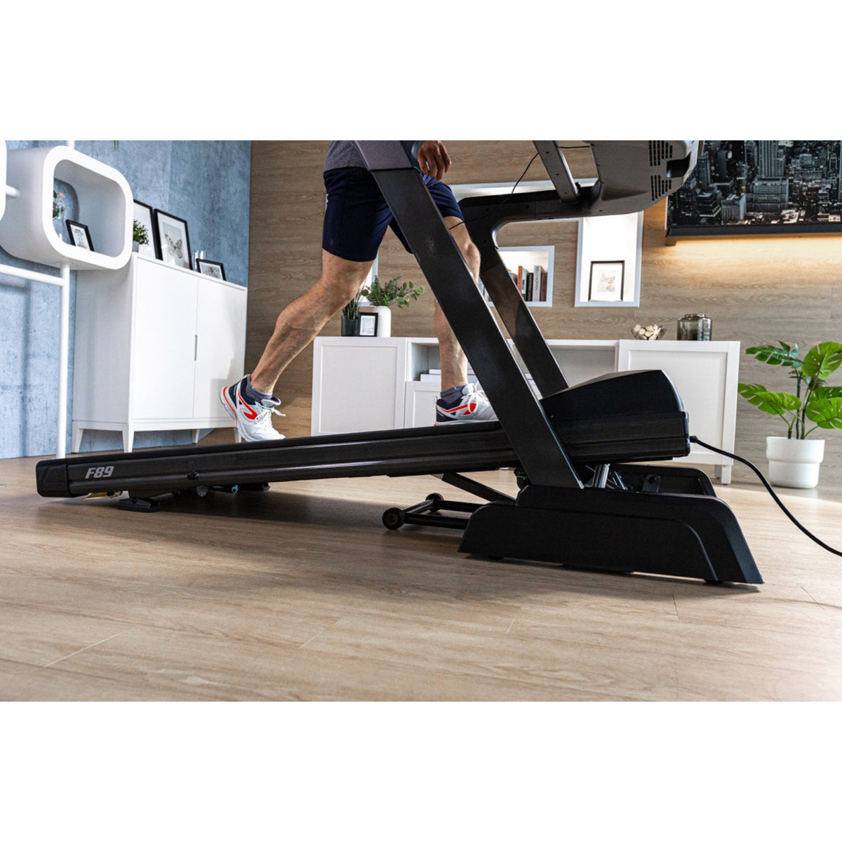 sole f89 treadmill person running on incline