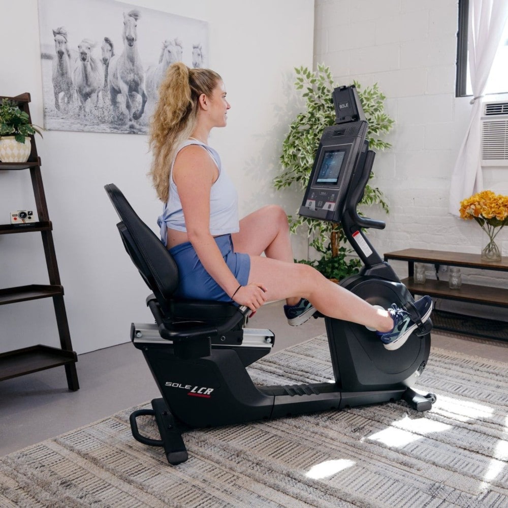 Sole fitness equipment console with touchscreen for workout tracking and controls