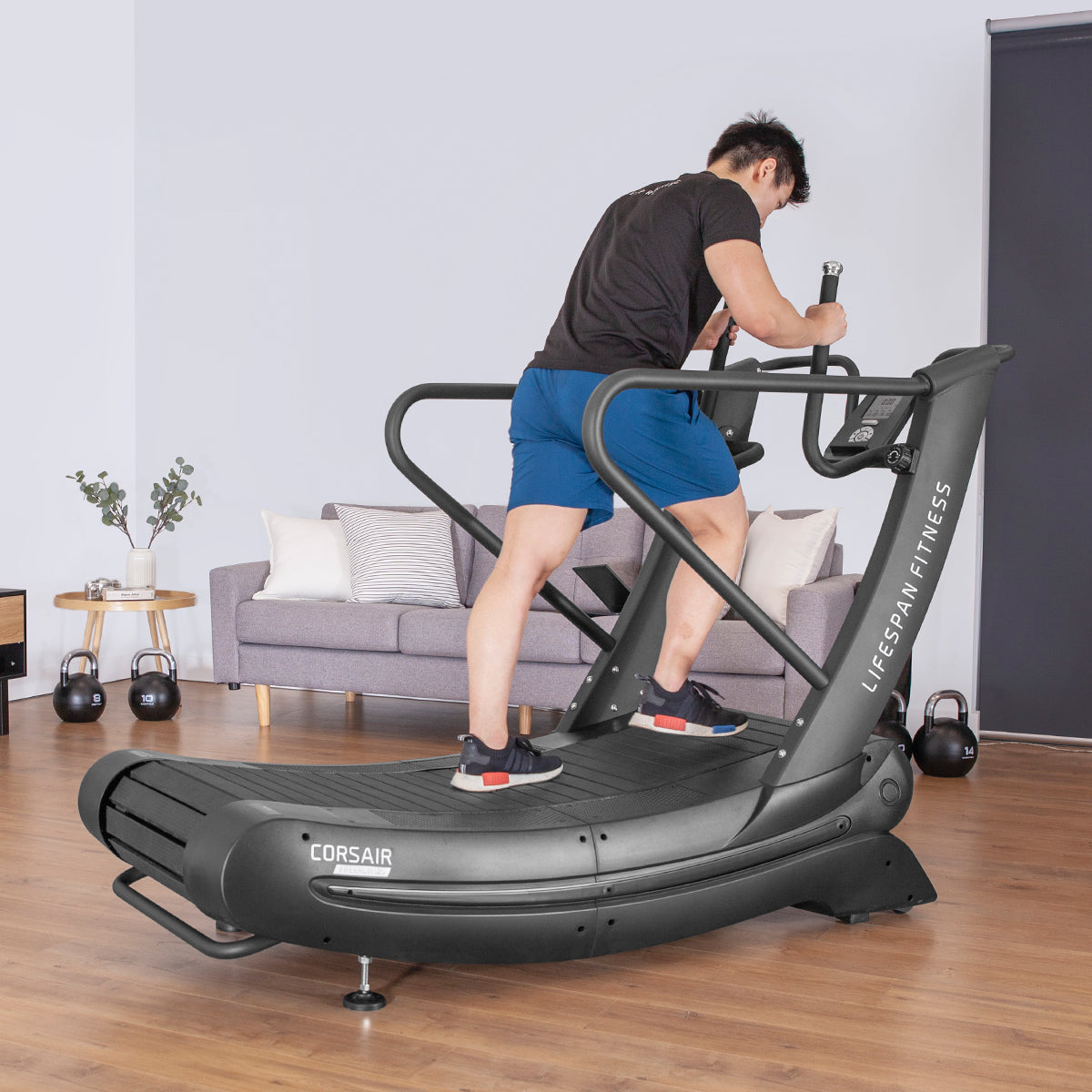Lifespan Fitness Corsair FreeRun 105 Curved Treadmill designed for an effective cardio workout, featuring a user running on its innovative curved surface in a modern indoor setting.